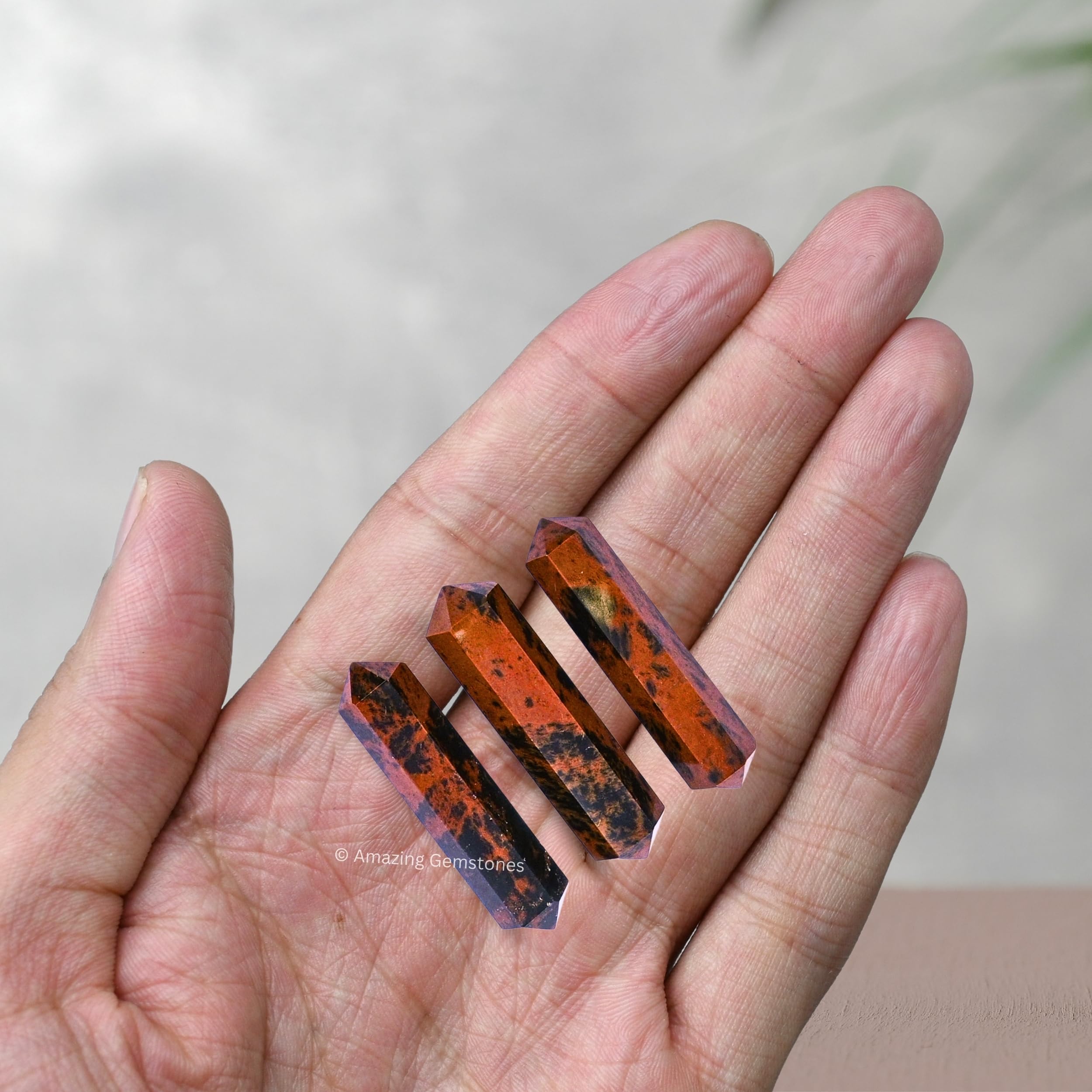 Amazing Gemstone mahogany obsidian point supports chakra balancing during yoga sessions