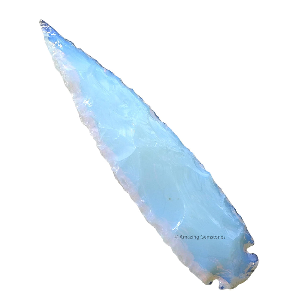 Amazing Gemstone opalite arrowhead closeup with shimmering surface for display