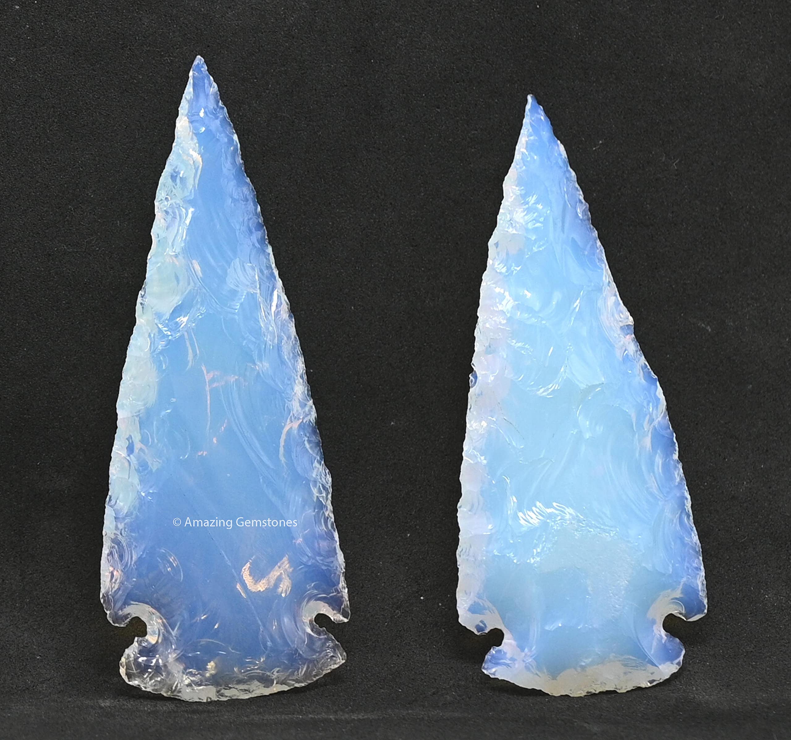 Close-up of Amazing Gemstone Opalite arrowhead crystal shows smooth edges for precise stringing.