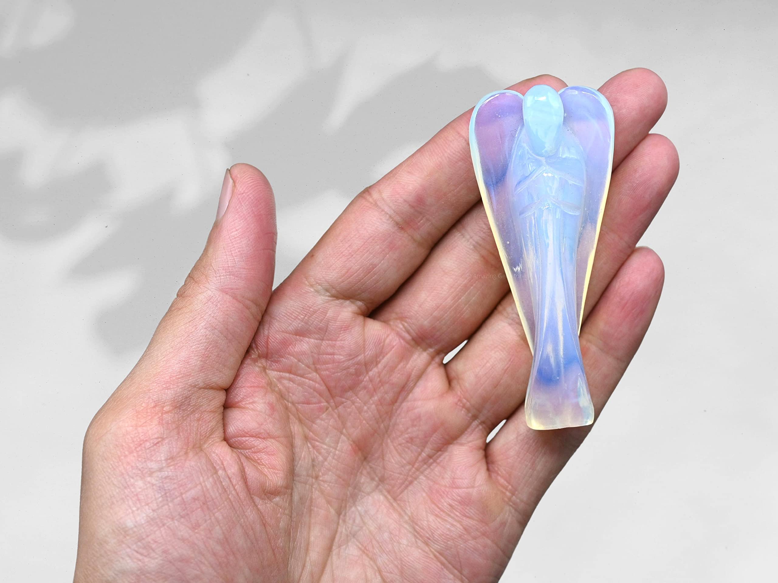 Amazing Gemstone Opalite velvet pouch protects the angel and supports display.