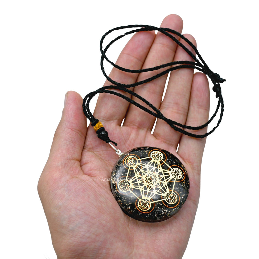 Amazing Gemstone Orgone Pendant worn on neck; adjustable cord for comfortable fit.