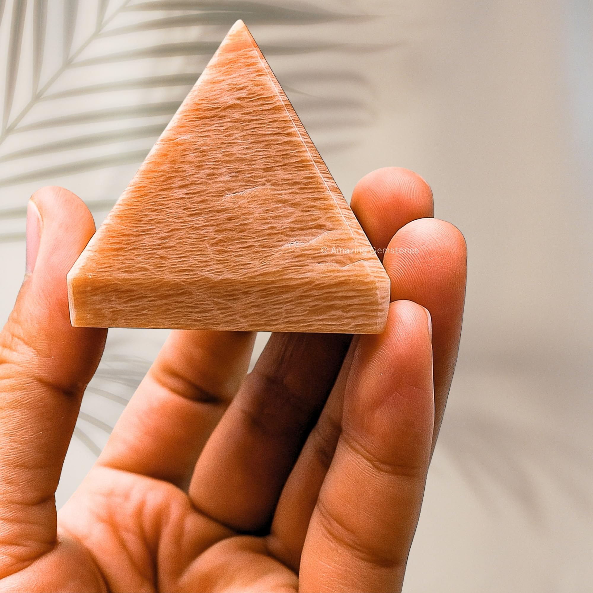 Closeup of Amazing Gemstone Peach Moonstone Pyramid surface detail