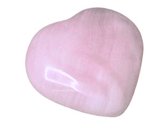 Amazing Gemstone Pink Calcite Heart Palm Stone front view for grounding practice.