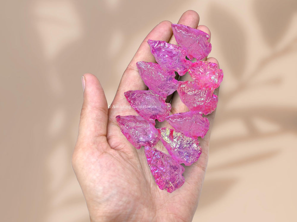 Amazing Gemstone pink rose aura quartz arrowhead used in a DIY jewelry accessory.