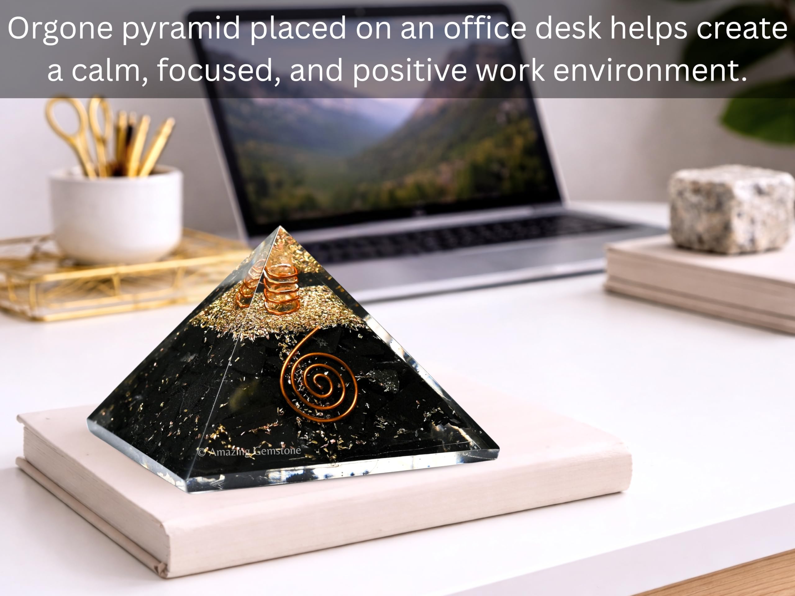 Amazing Gemstone pyramid on desk acts as a stylish paperweight
