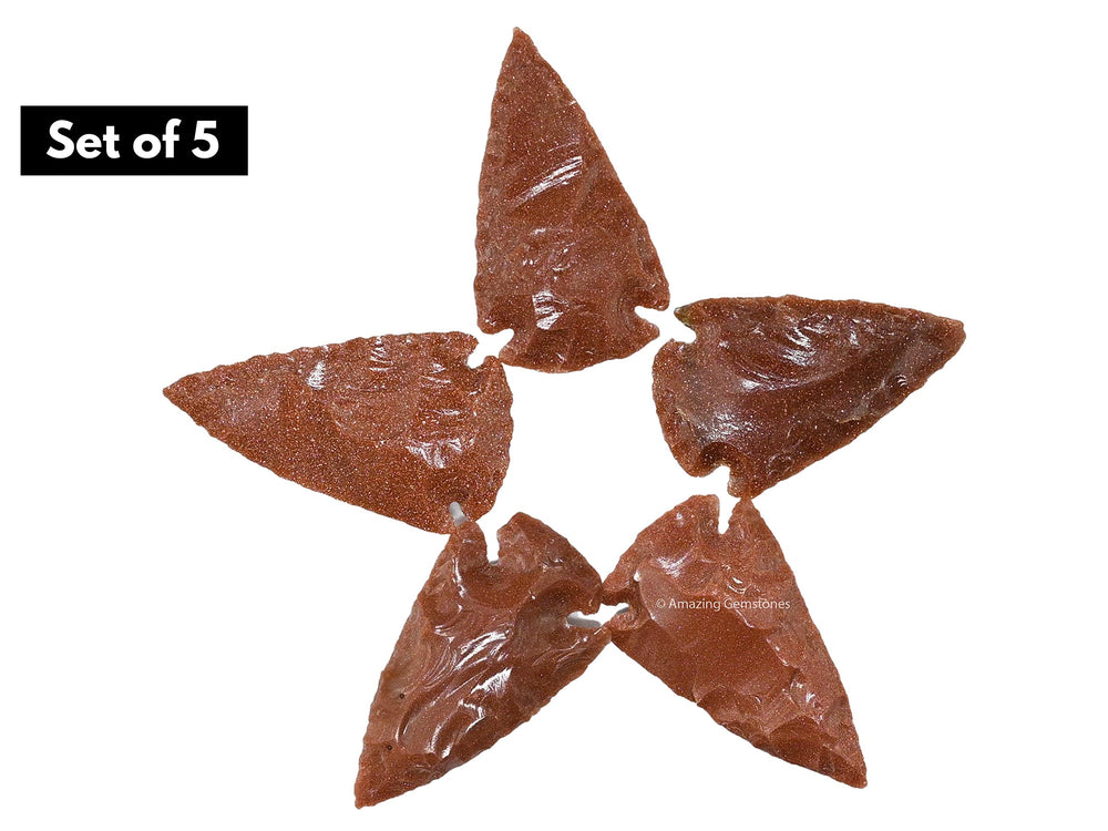 Amazing Gemstone red goldstone arrowheads five-piece set in velvet bag for display.