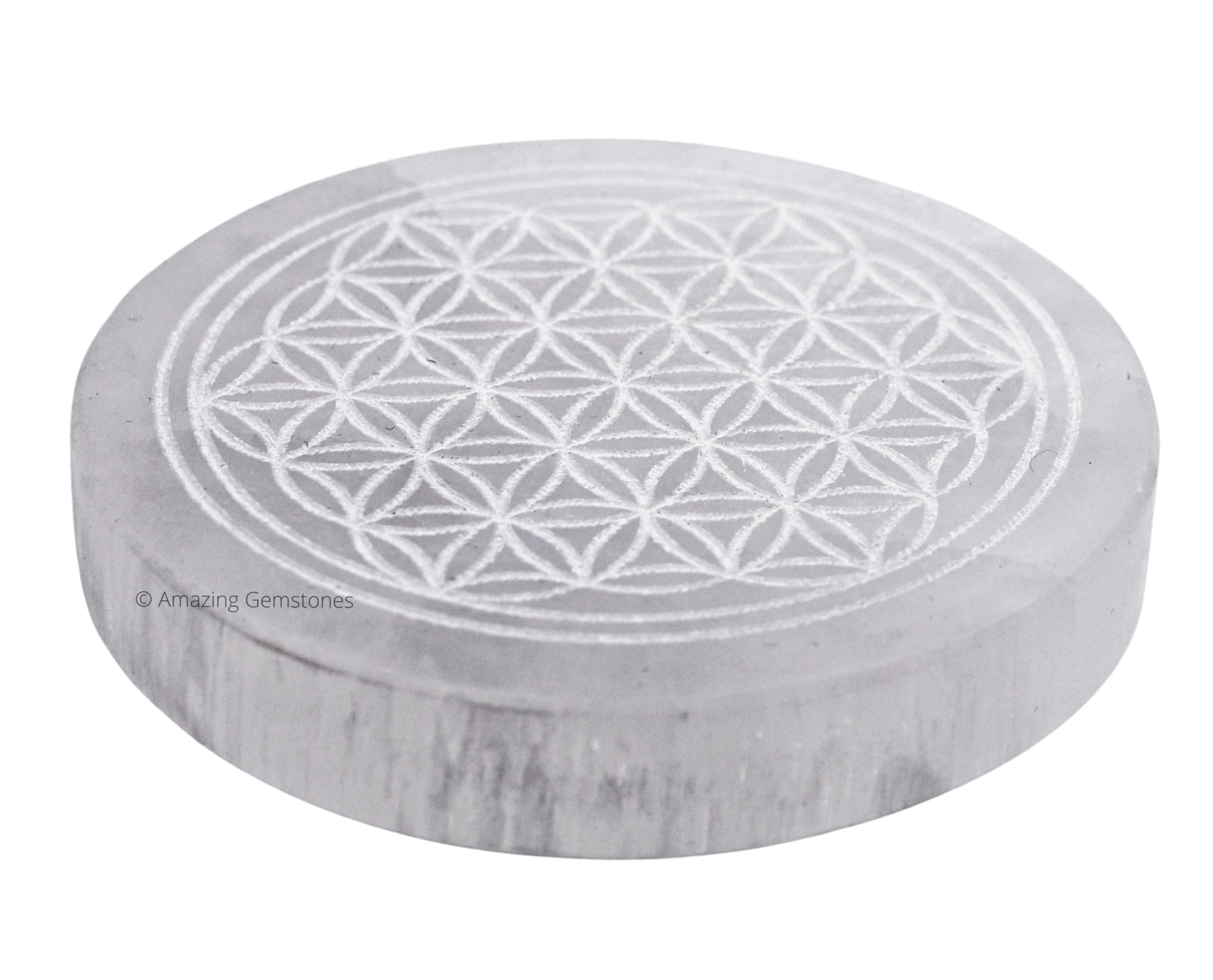 Amazing Gemstone selenite round disc on desk enhances crystal recharging and energy clarity