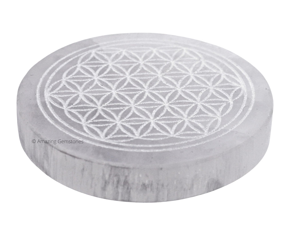 Amazing Gemstone selenite round disc on desk enhances crystal recharging and energy clarity
