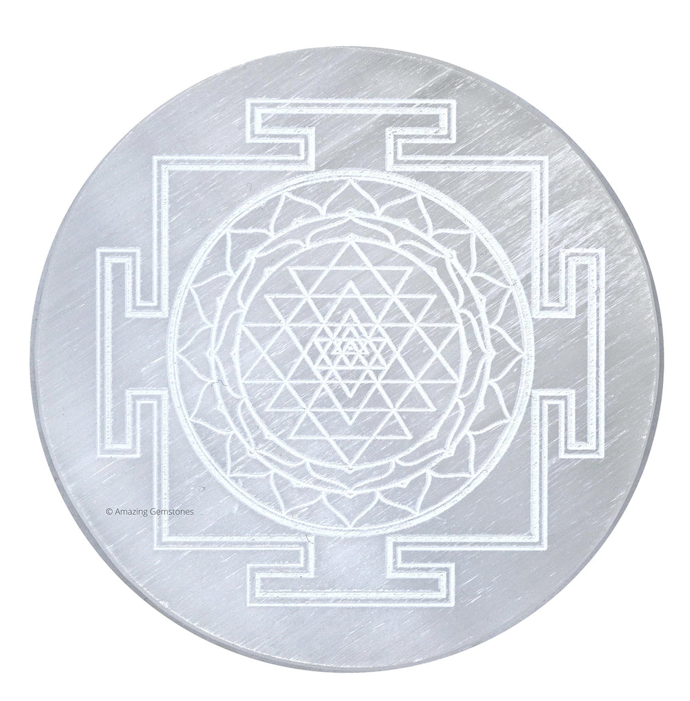 Amazing Gemstone Selenite Plate showing energy amplification for crystals on a desk