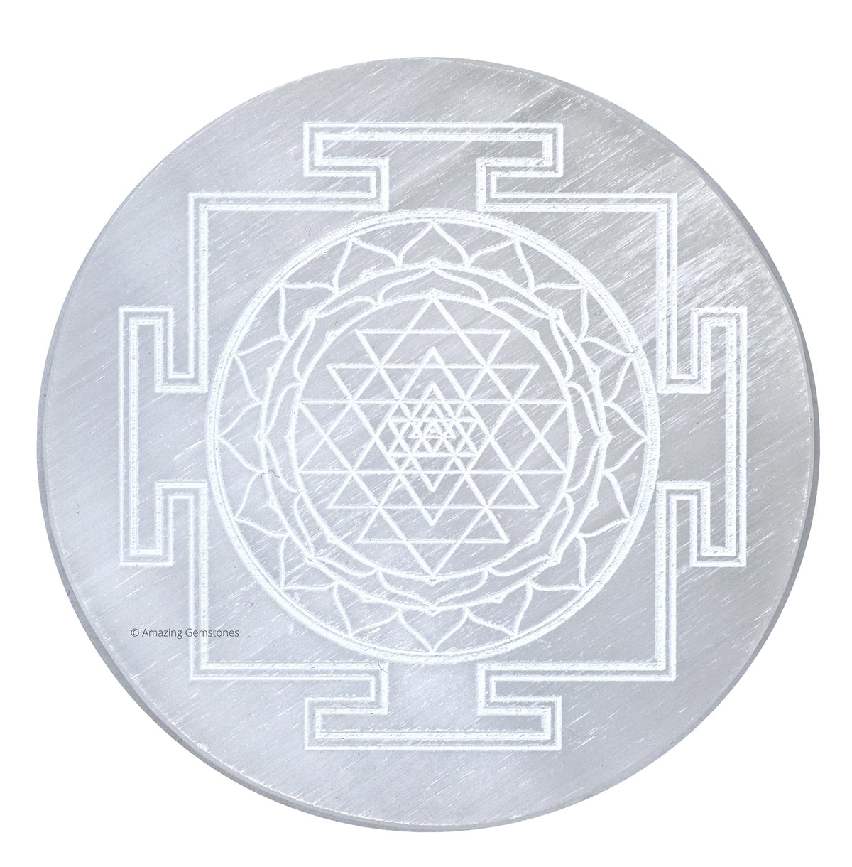 Amazing Gemstone Selenite Plate showing energy amplification for crystals on a desk