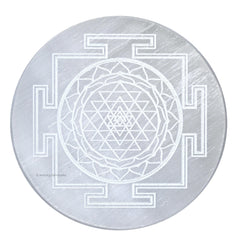 Amazing Gemstone Selenite Plate showing energy amplification for crystals on a desk