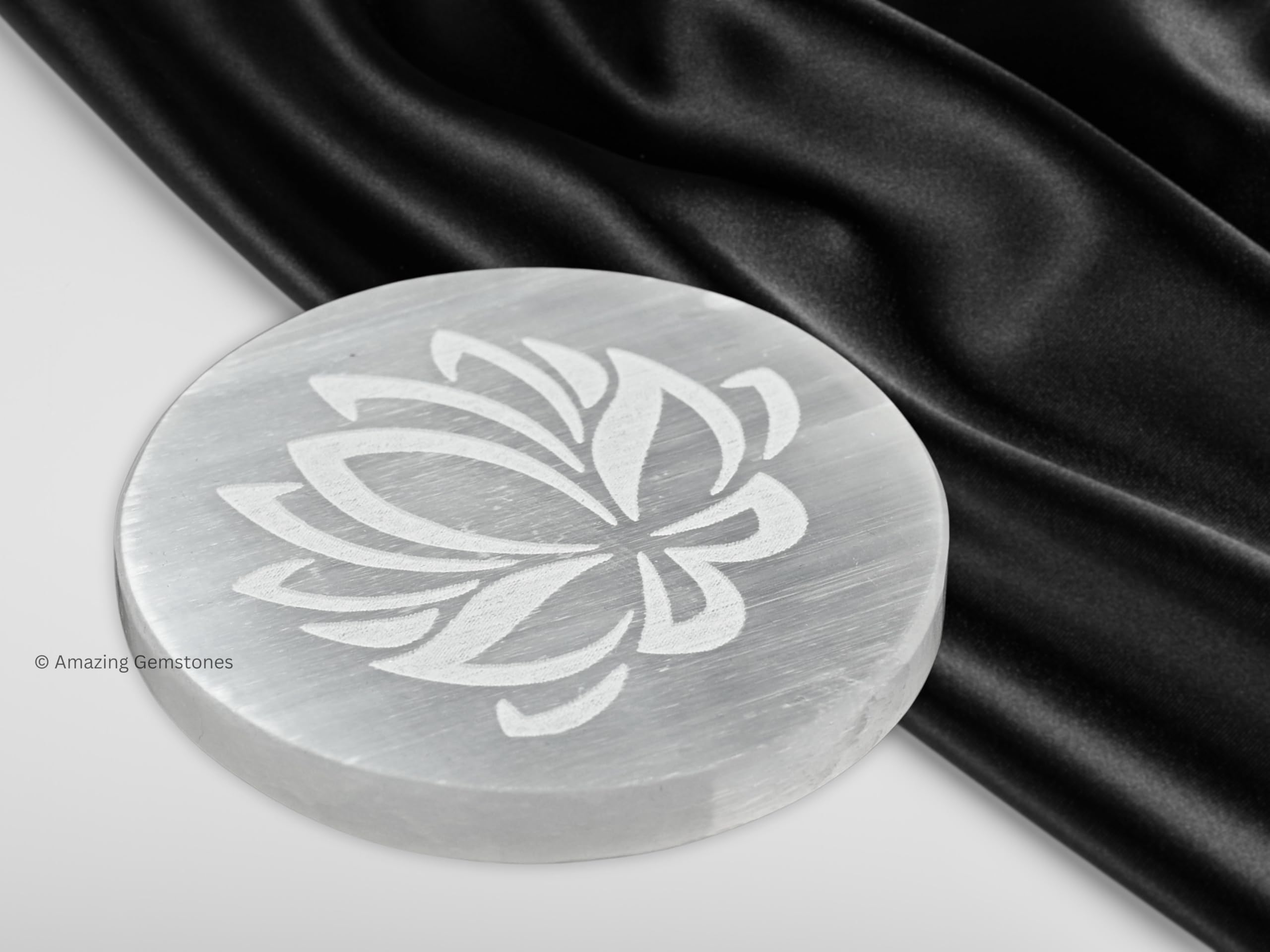 Amazing Gemstone selenite plate features lotus design for balance.
