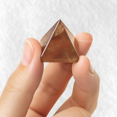 Desk meditation scene featuring Amazing Gemstone smoky quartz pyramid.