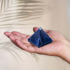 Amazing Gemstone sodalite pyramid on an altar or desk as a decorative focal point