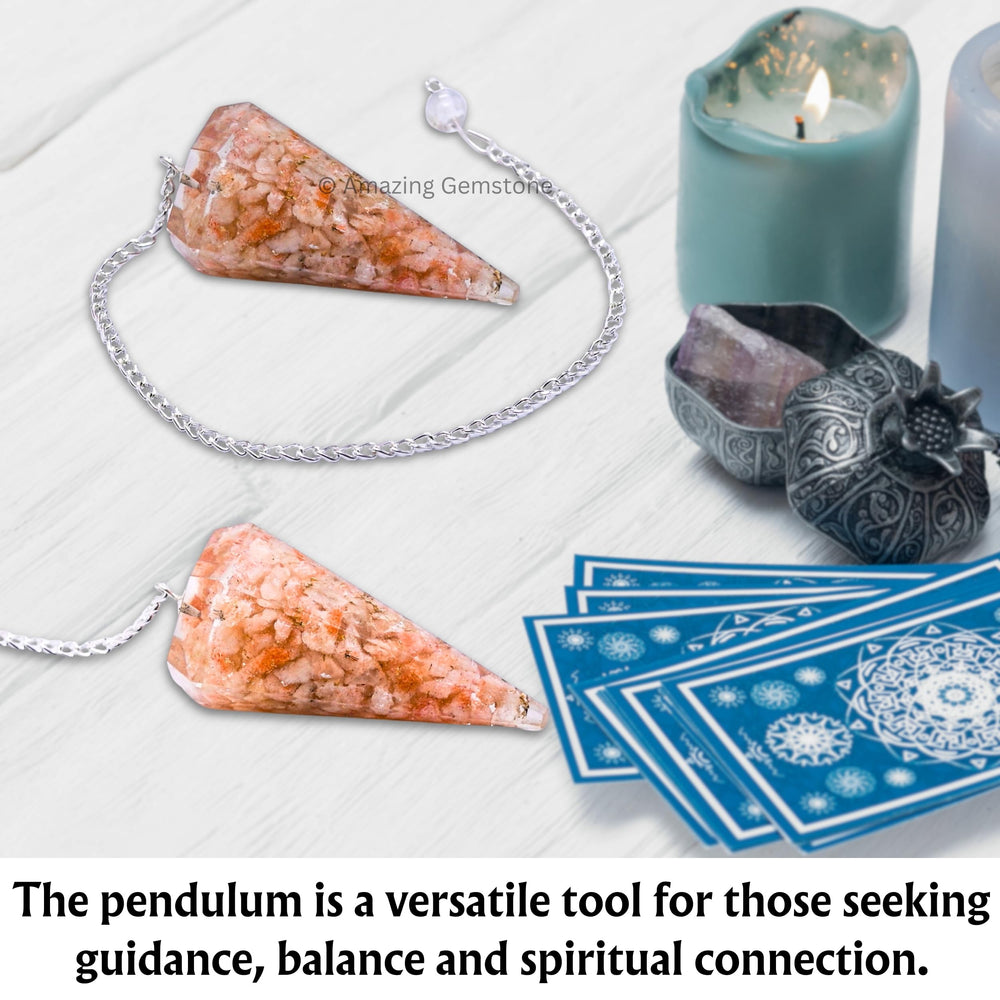 Amazing Gemstone Sunstone Orgone Pendulum placed on a crystal grid for decorative energy.
