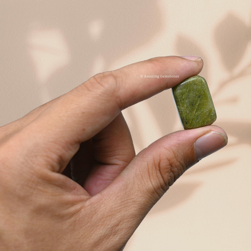 Amazing Gemstone Vesuvianite tumbled stones add elegance to crystal shelves.