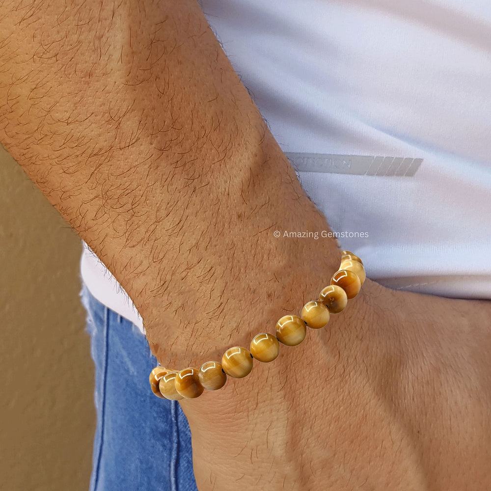 Amazing Gemstone Yellow Cat's Eye bracelet on wrist with adjustable fit for daily wear.