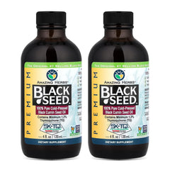 Amazing Herbs Black Seed Oil bottle pour shows amber oil for digestive support.