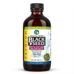 Amazing Herbs Premium Black Seed Oil bottle on kitchen counter for daily wellness.