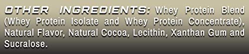 Amazing Muscle whey shake glass demonstrates creamy texture for tasty recovery.