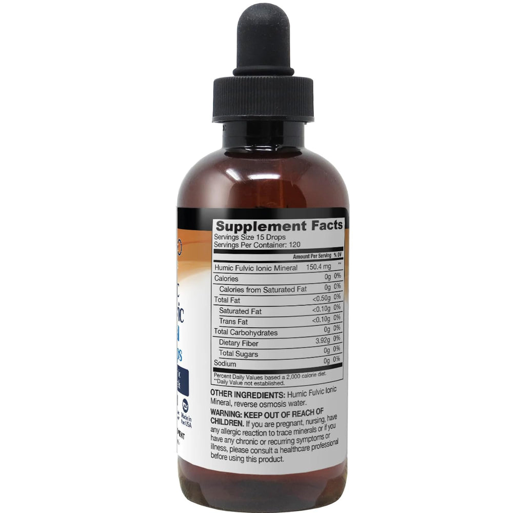 Ameo Life Humic & Fulvic Mineral Drops for daily routine with glass and spoon.