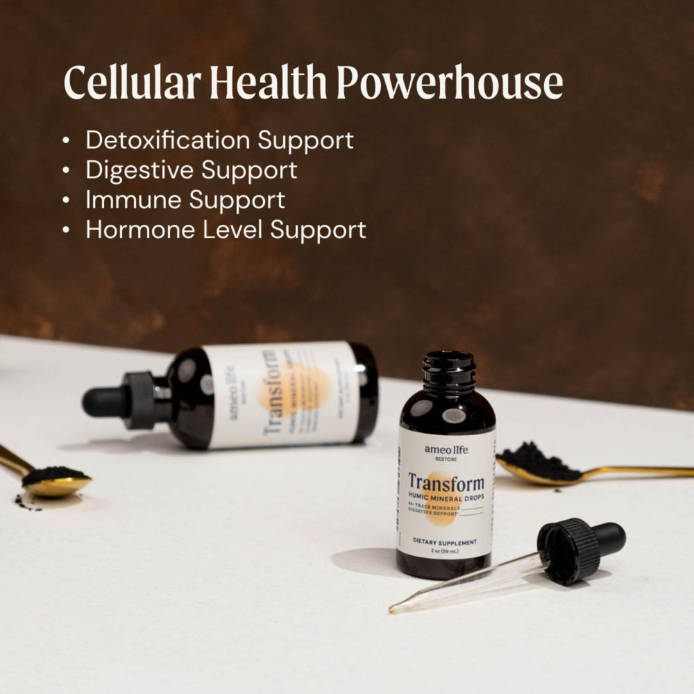 Ameo Life Humic & Fulvic Mineral Drops being poured for easy daily mixing.