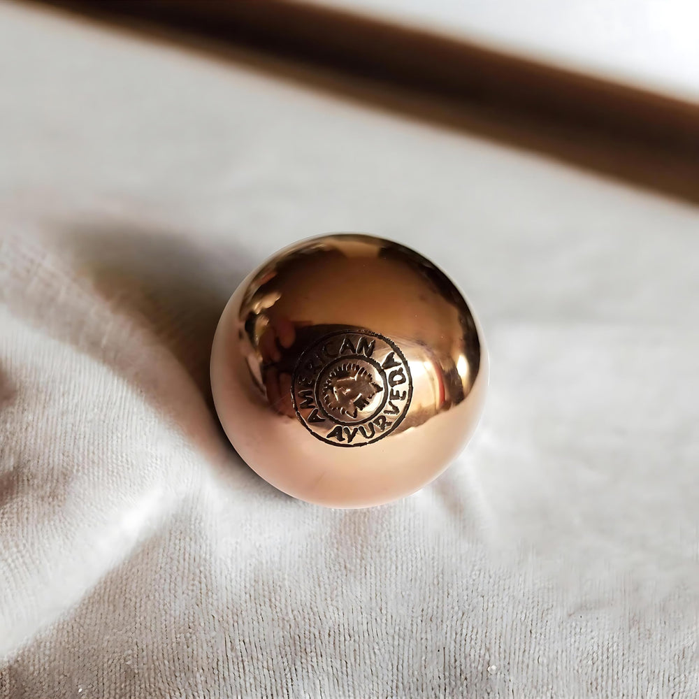 American Ayurveda copper ball during handheld meditation promotes grounding and focus