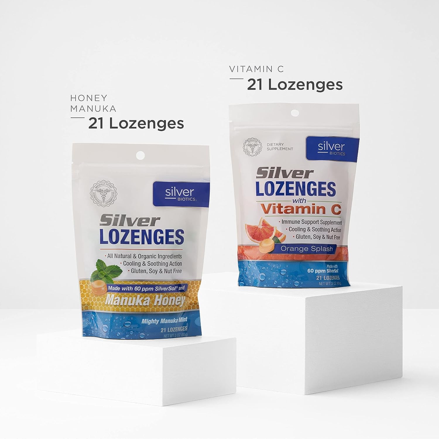 American Biotech Labs bottle with lozenges spilled on surface