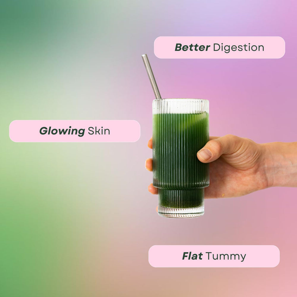 Ami Fitness Glow Greens vitamin label close-up highlighting probiotics and vitamins.