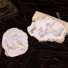 Amogeeli crystal geode cluster displayed on a desk for decorative appeal.