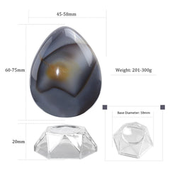 Amogeeli Orca Agate Sphere close-up reveals natural banding and smooth texture for meditation.