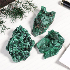 Amogeeli small malachite stone specimen showing natural patterns and color