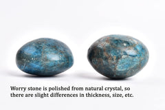 AMOYSTONE Apatite worry stone in hand for tactile calm and focus.