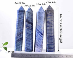 AMOYSTONE blue aventurine obelisk displayed in a calm room setting.
