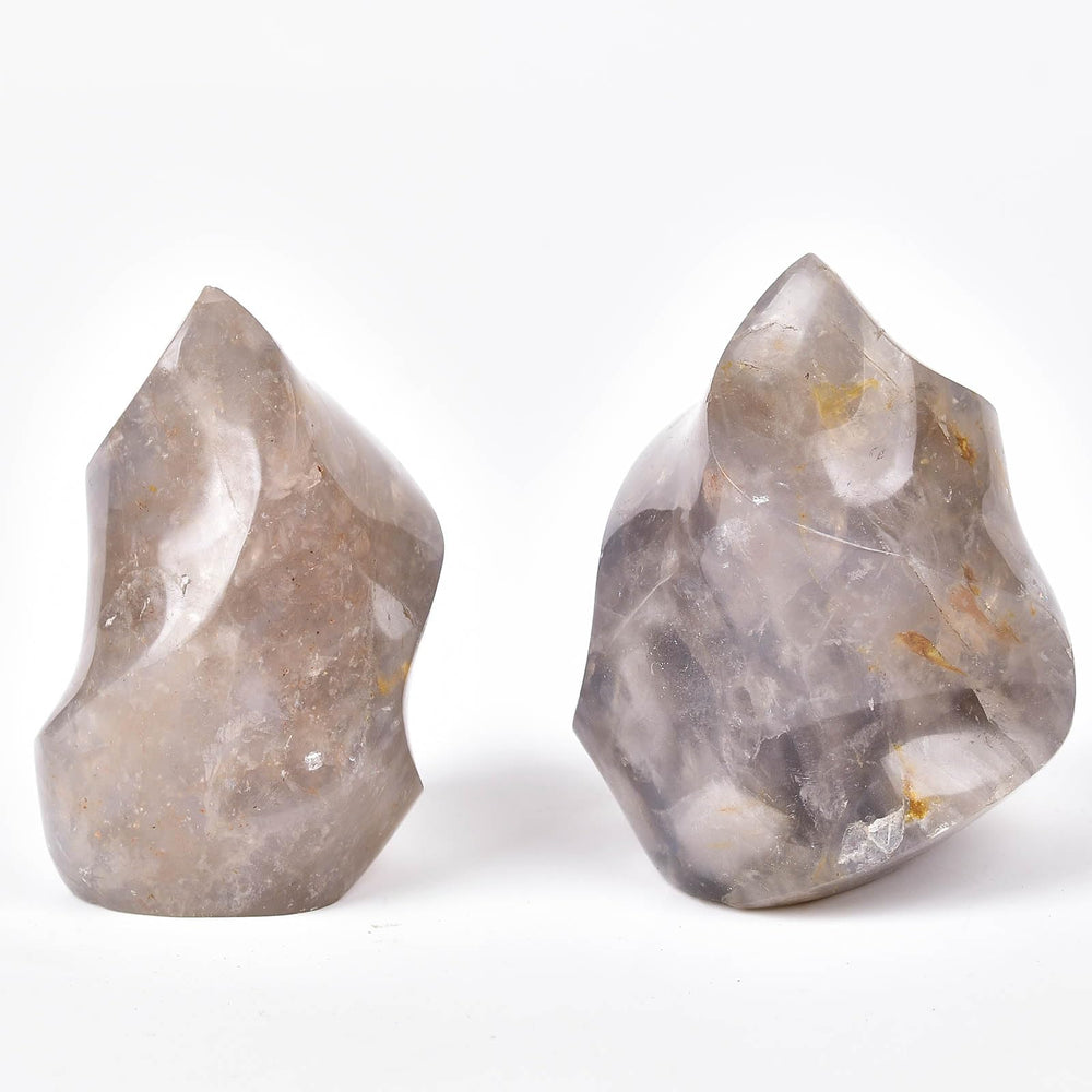 AMOYSTONE Blue Pink Quartz Flame Tower glowing softly as a night-time accent.
