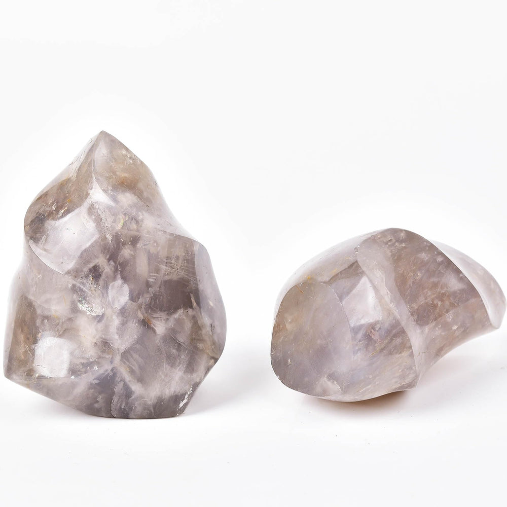 AMOYSTONE Blue Pink Quartz Flame Tower shown in a yoga space for grounding practice.