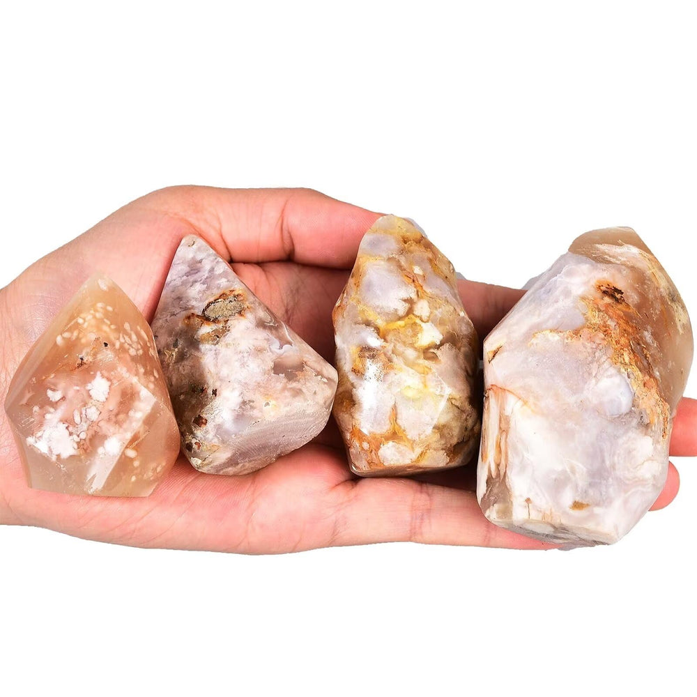 AMOYSTONE Cherry Blossom Agate flame tower closeup highlights floral inclusions for serene decor.