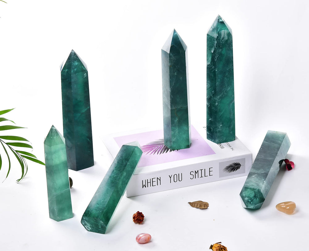 AMOYSTONE Green Fluorite Obelisk on desk to promote focus and creativity.