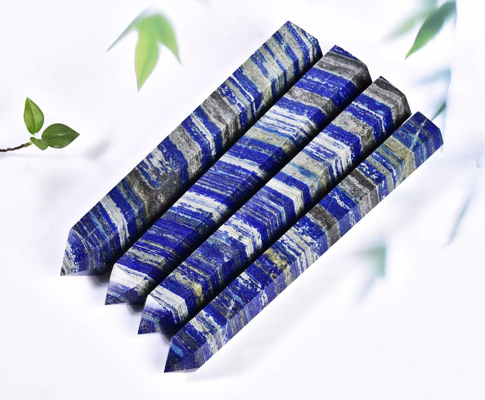 AMOYSTONE Hand-held lapis lazuli obelisk demonstrates weight and energy focus