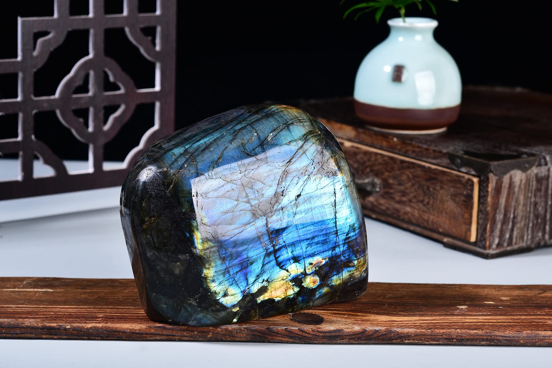 AMOYSTONE labradorite slab being cleansed and charged in sun or moon.