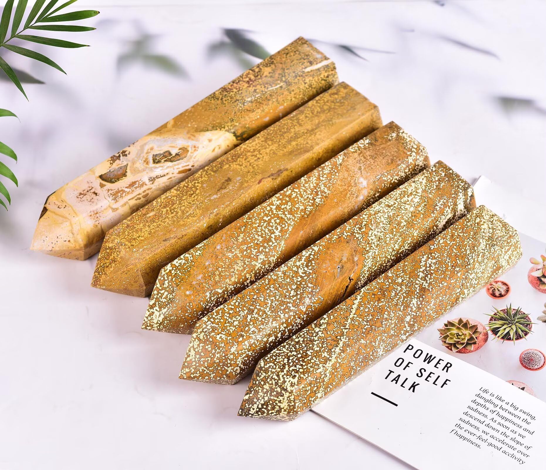 AMOYSTONE six-faceted wand adds a striking spa-like presence