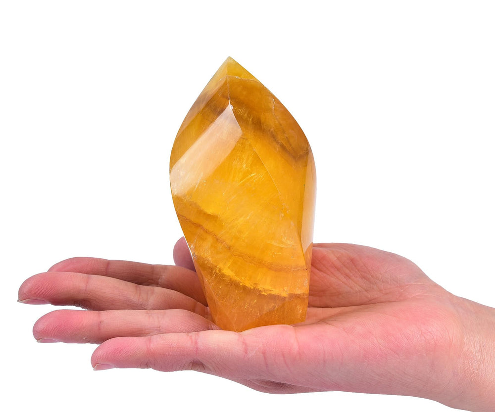 AMOYSTONE orange fluorite tower closeup spiral point showcases bold design for creativity.