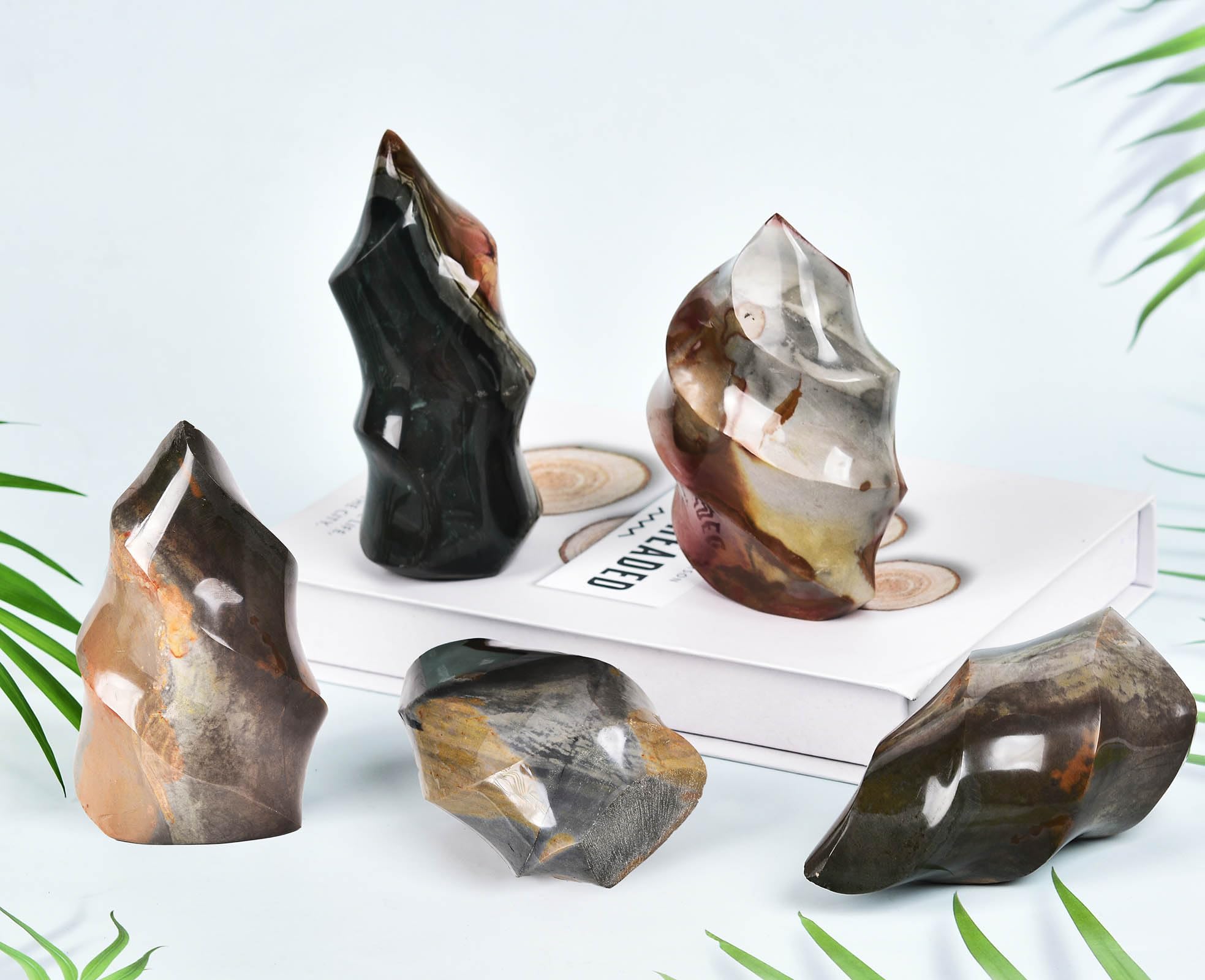 AMOYSTONE Polychrome Jasper flame tower weighing 1.5-2.2 lbs on display