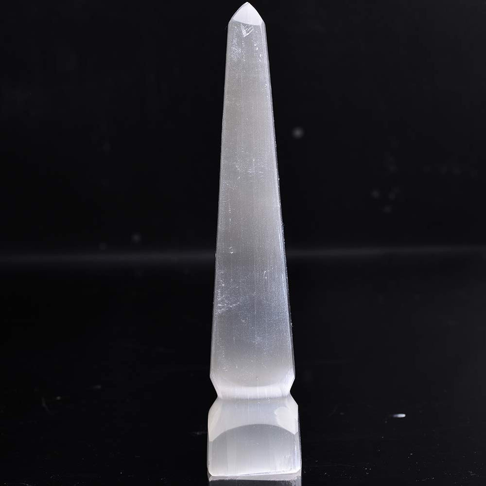 AMOYSTONE Selenite Tower closeup showing delicate striations and pearl glow.