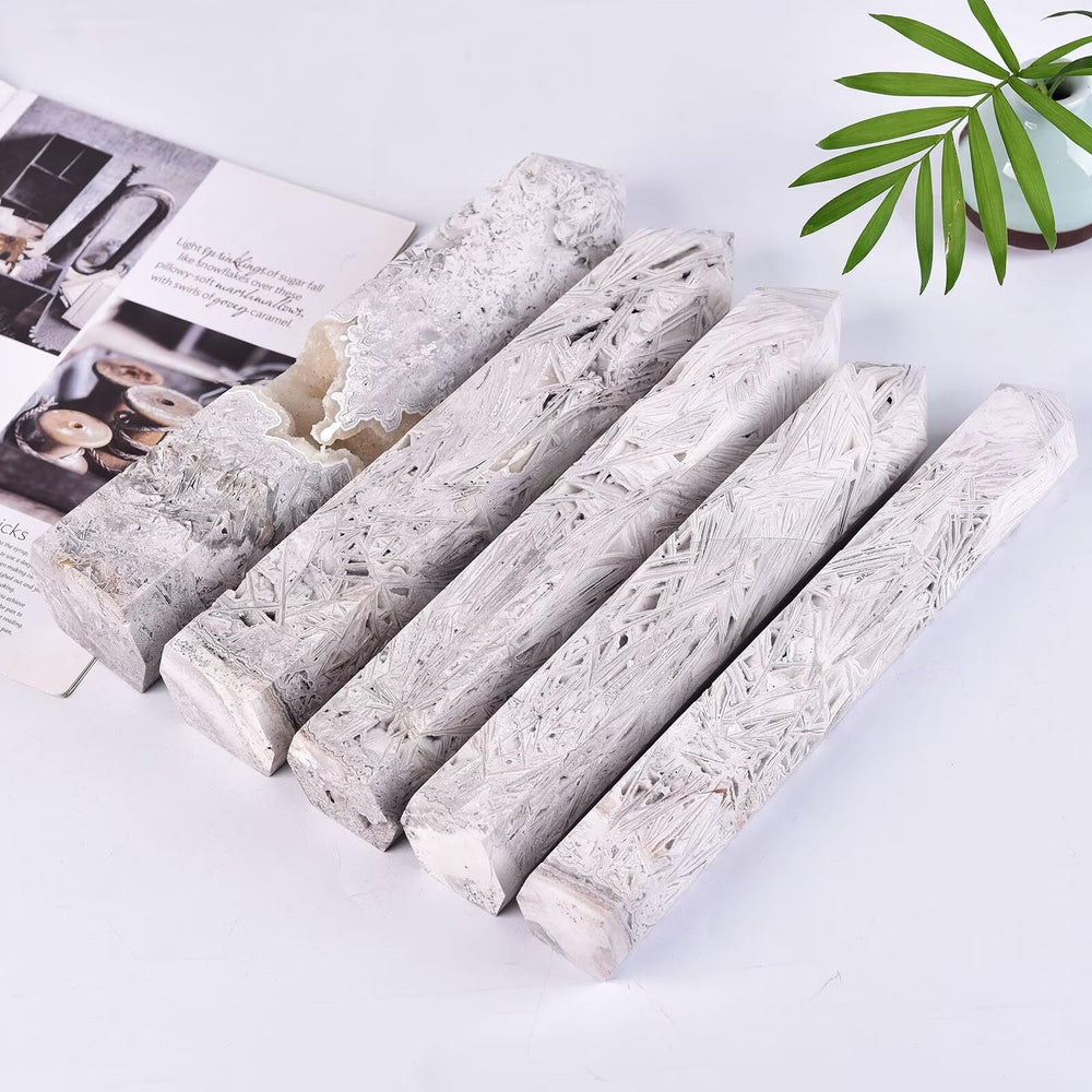 AMOYSTONE six-faceted wand showcased as a calm, decorative obelisk.