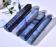 AMOYSTONE six-faceted wand in blue aventurine showing craftsmanship and sparkle.