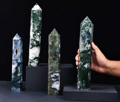 AMOYSTONE moss agate obelisk table decor with natural color variations.