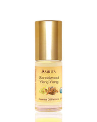 AMRITA Aromatherapy sandalwood-ylang-ylang perfume bottle for grounding relaxation and sensory ritual.