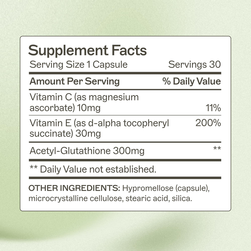 Amy Myers MD Glutathione capsules dispersed on a clean surface suggest easy daily use.
