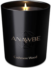 ANAWBE Cashmere Wood candle in a jar enhances ambiance with a warm, woodsy scent.